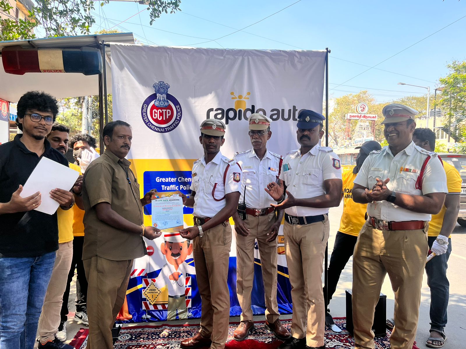 Rapido Auto Captain were awarded certificates by police Sub inspectors Mr. Pithakaras & Mr. Jenish